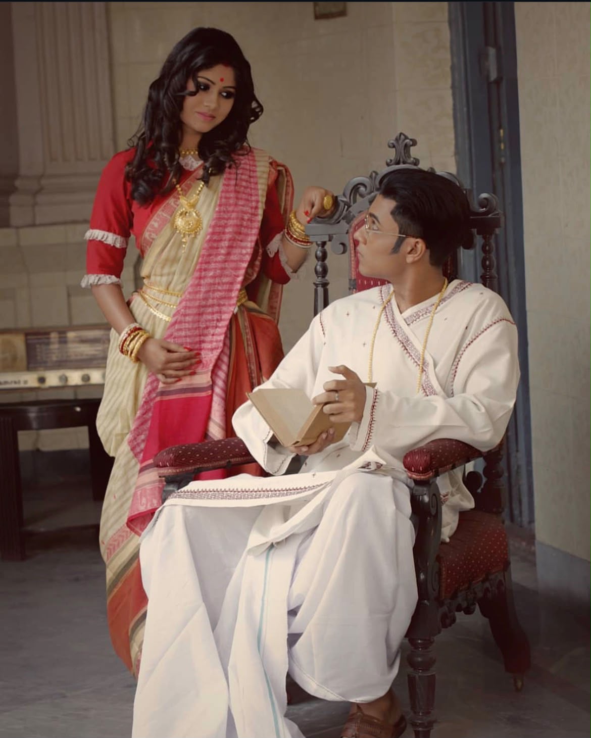 Period-styled couple in a heritage Calcutta interior
